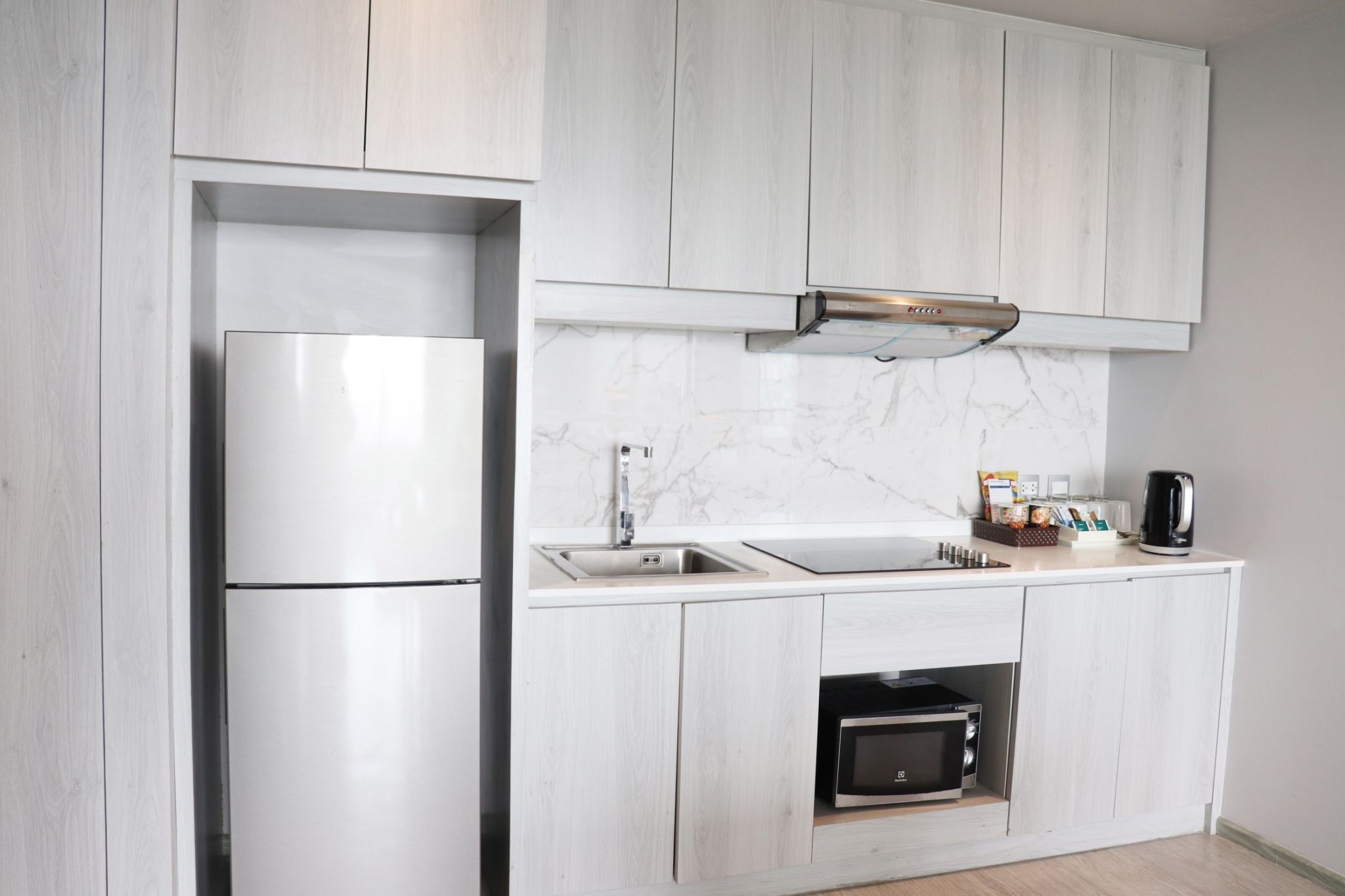 family suite, 2 bedrooms | private kitchen | fridge, microwave, coffee/tea maker, electric kettle