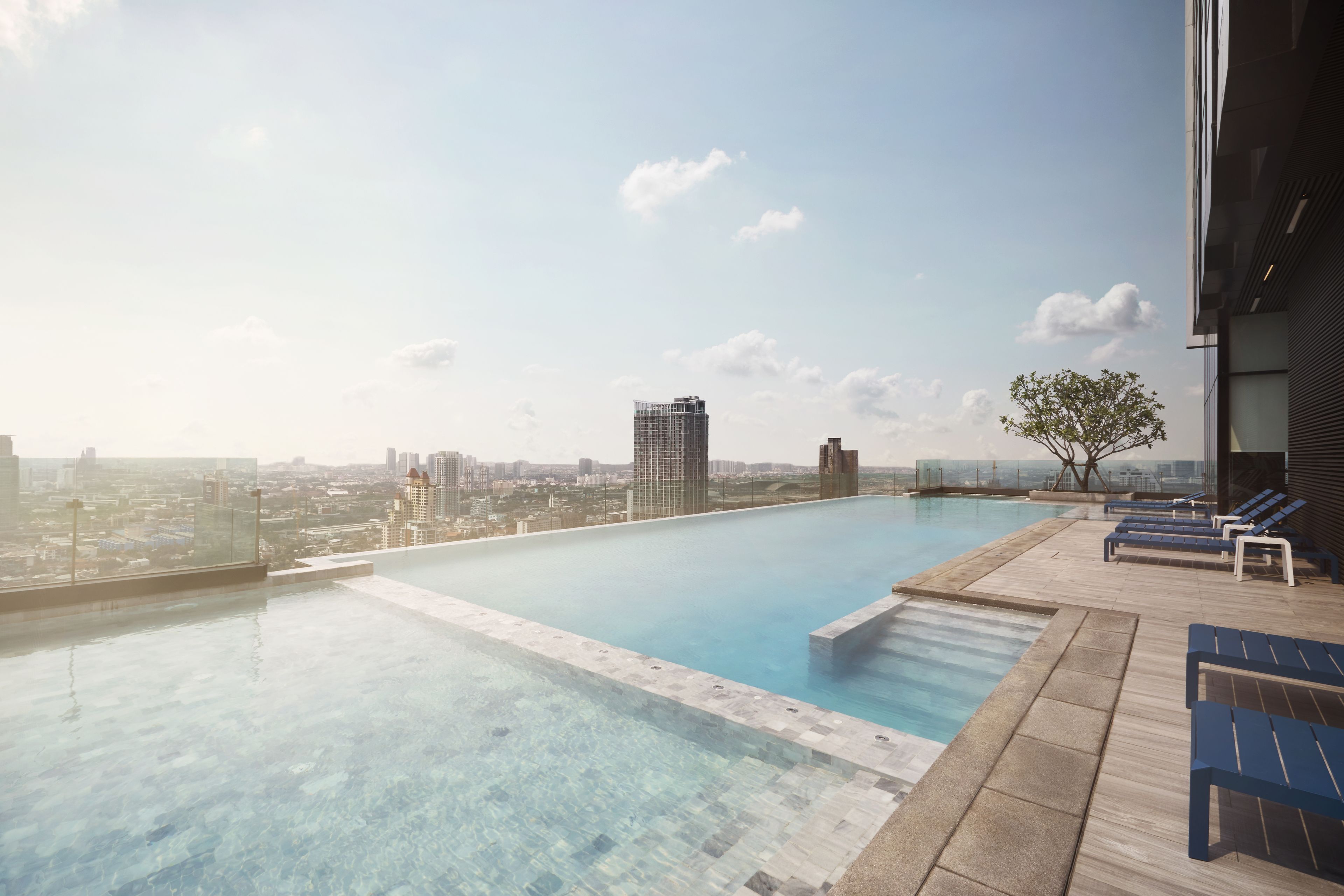 outdoor pool, open 6 am to 10 pm, pool loungers