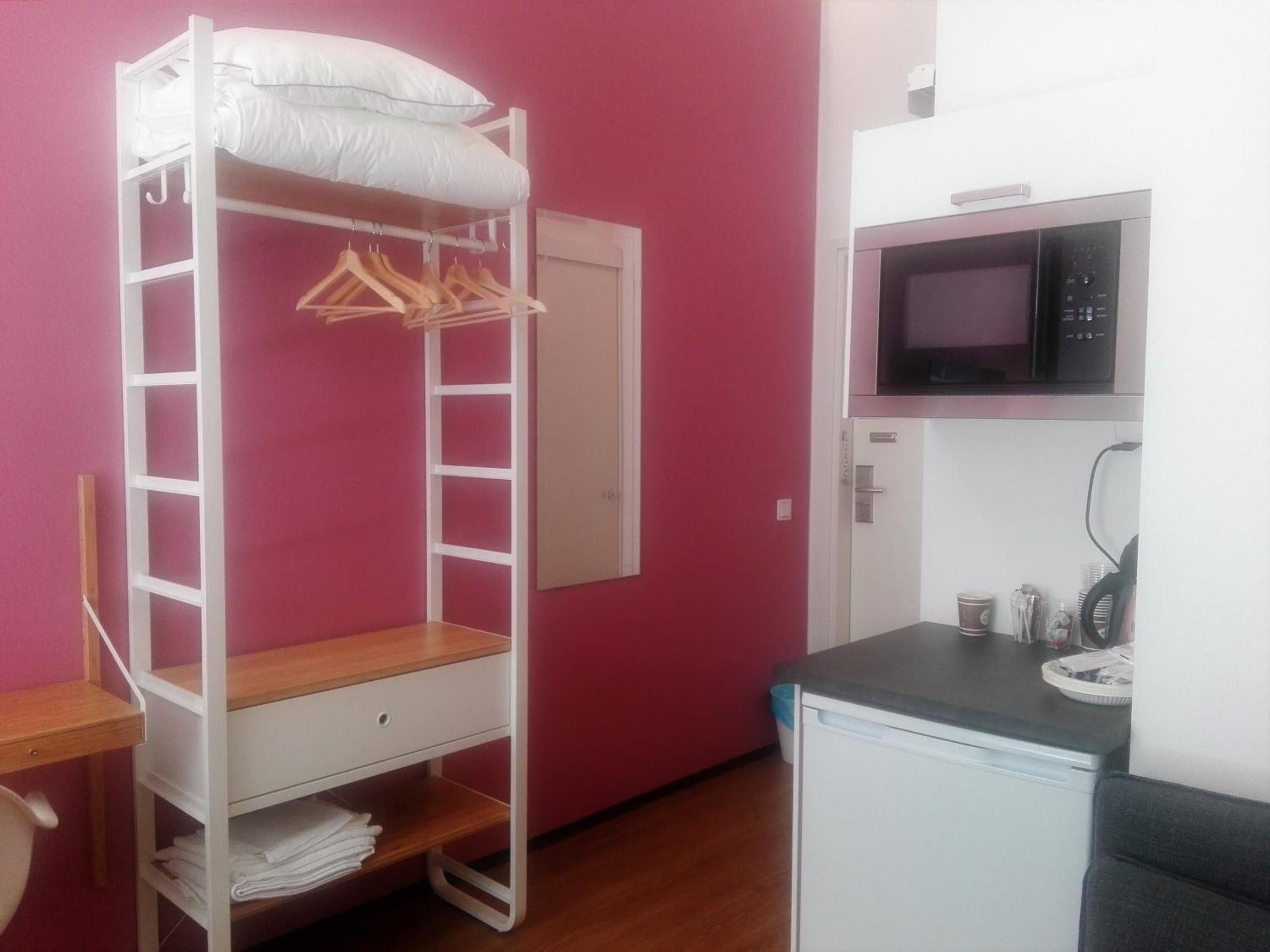 desk, blackout curtains, free wifi, bed sheets