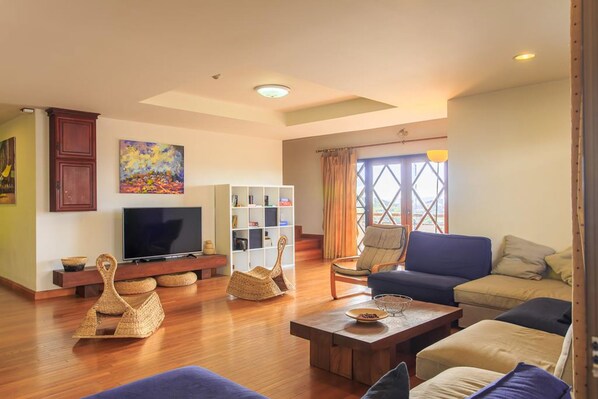 40-inch flat-screen TV with cable channels, TV