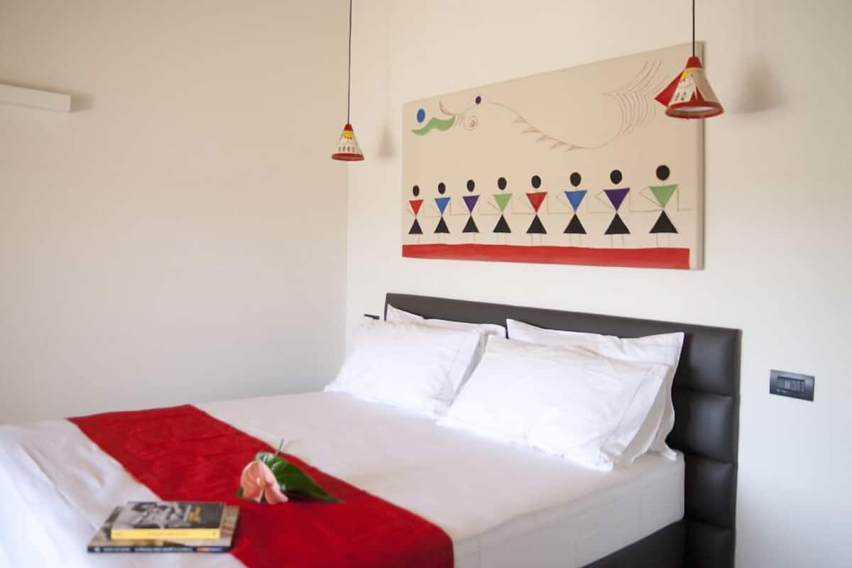 Suite superior, balcón | Ropa de cama de alta calidad y caja de seguridad en la habitación
