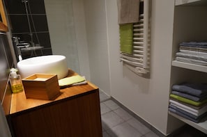 Shower, hair dryer, towels, soap