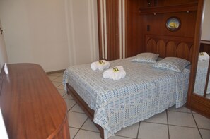 Apartamento standard, 2 quartos | 4 quartos, ferros/tábuas de passar roupa, berços (sobretaxa)