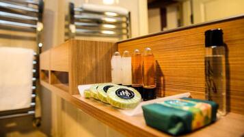 Shower, free toiletries, hair dryer, slippers