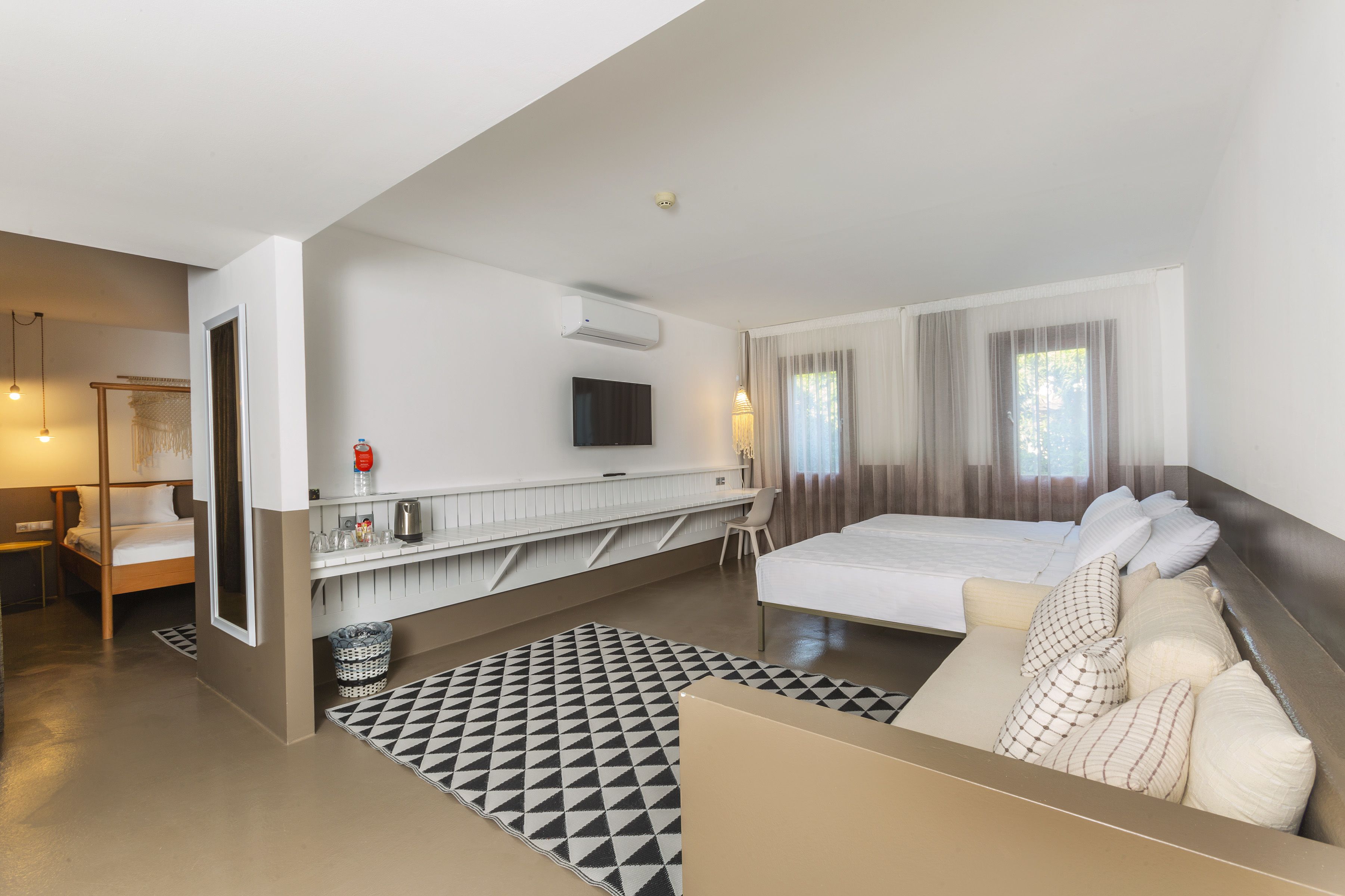 2 bedroom deluxe room, balcony, pool view | 1 bedroom, minibar, in-room safe, desk