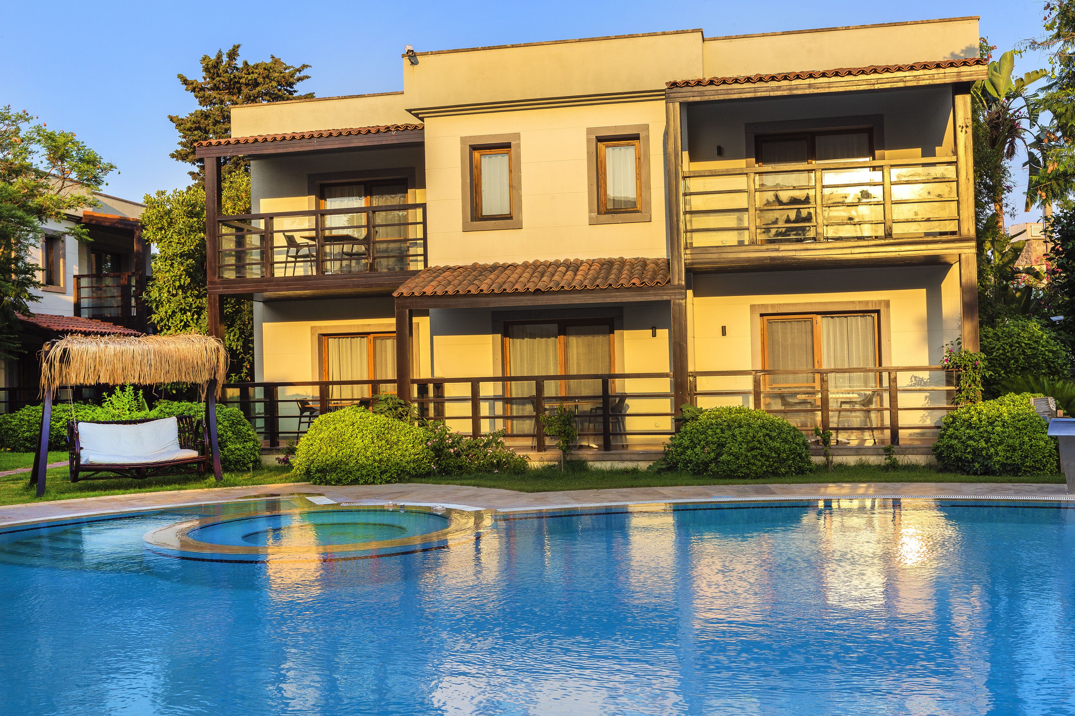 seasonal outdoor pool, open 8:30 am to 6:30 pm, pool umbrellas