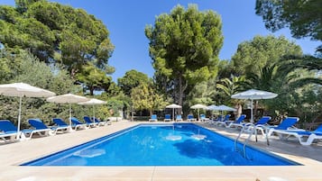 Outdoor pool, pool umbrellas, pool loungers