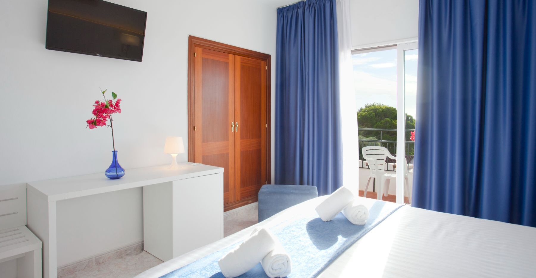 standard double room, balcony, garden view | 1 bedroom, in-room safe, desk, blackout curtains