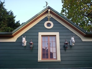 Details of Carriage house hayloft and weather vane