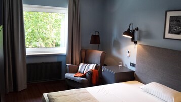 Ropa de cama de alta calidad, minibar y escritorio 