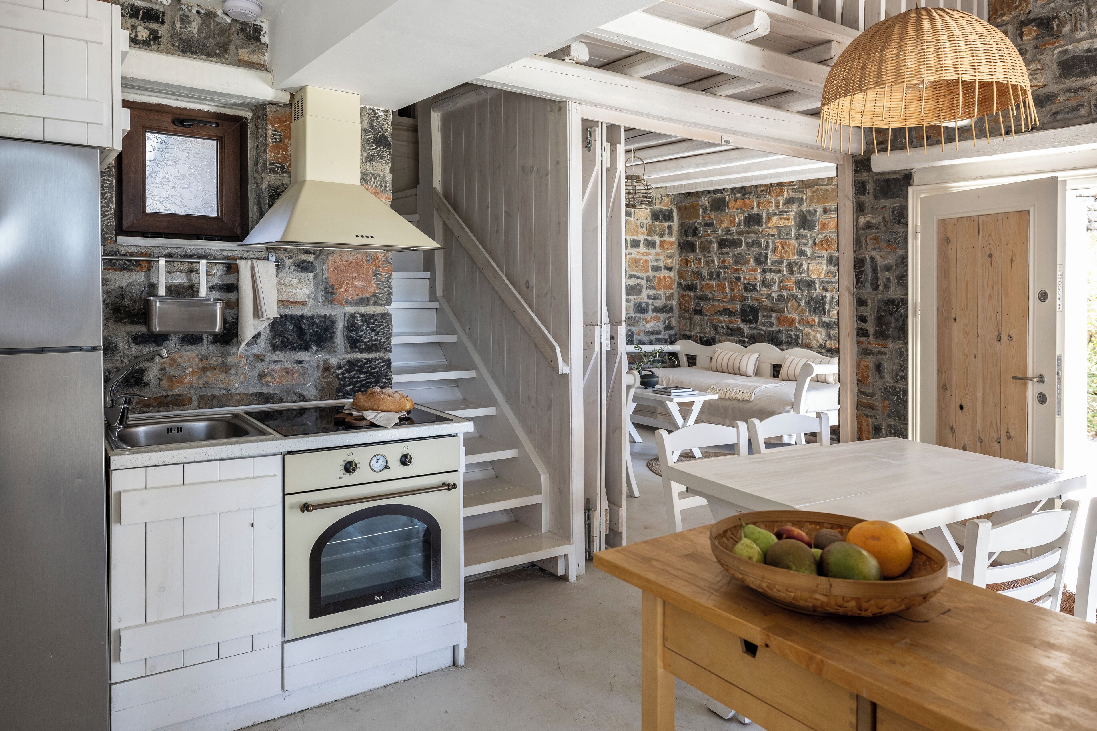 full-sized fridge, oven, stovetop, coffee/tea maker