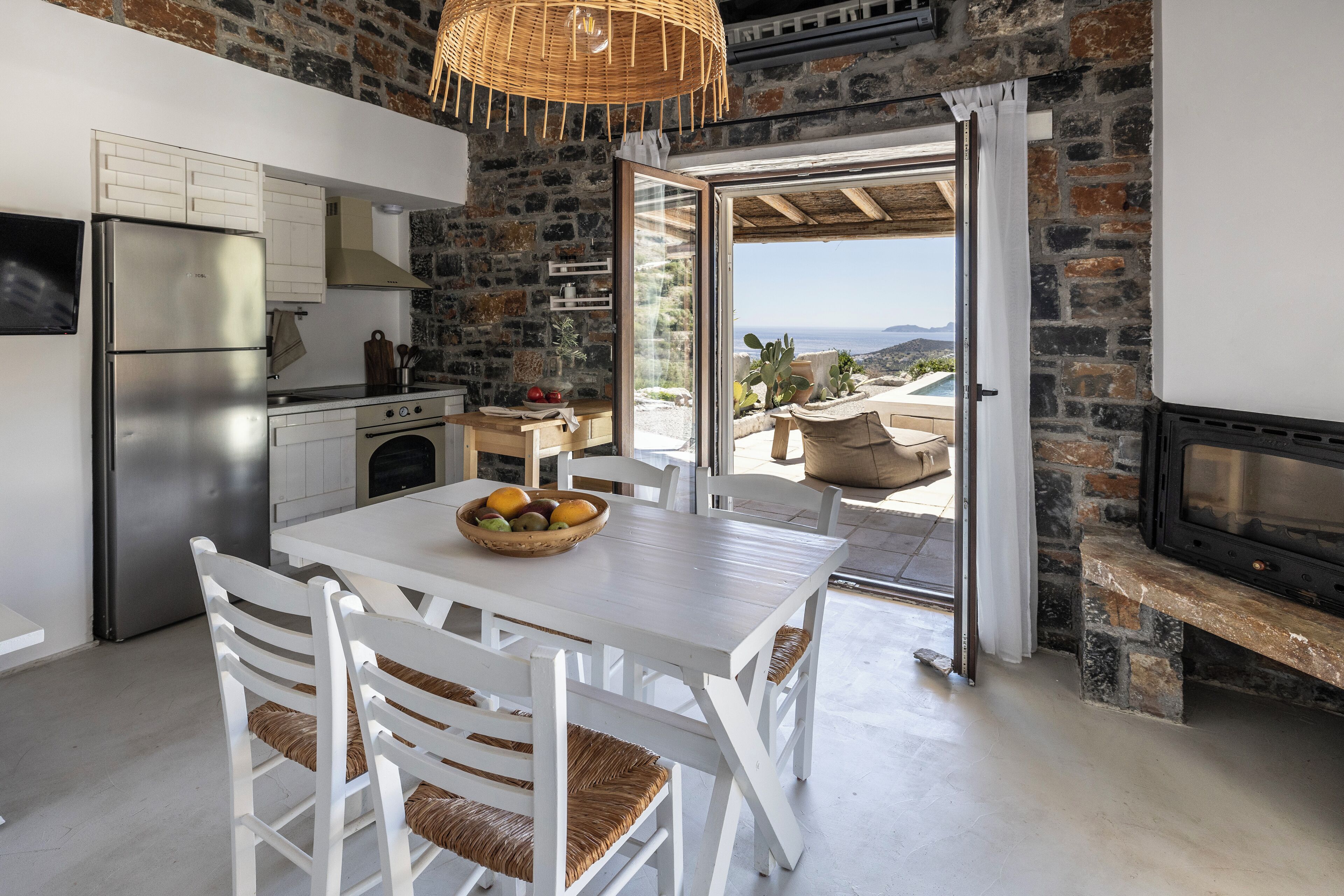 two bedroom villa with private pool | living area | 32-inch smart tv with satellite channels, tv, fireplace