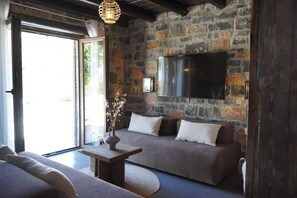 One Bedroom Villa with shared pool | Coin séjour