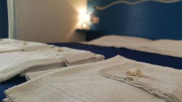 Family Room | 1 bedroom, premium bedding, minibar, in-room safe