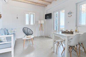 Superior Suite, 2 Bedrooms, Sea View | Living area | 32-inch flat-screen TV with digital channels, TV