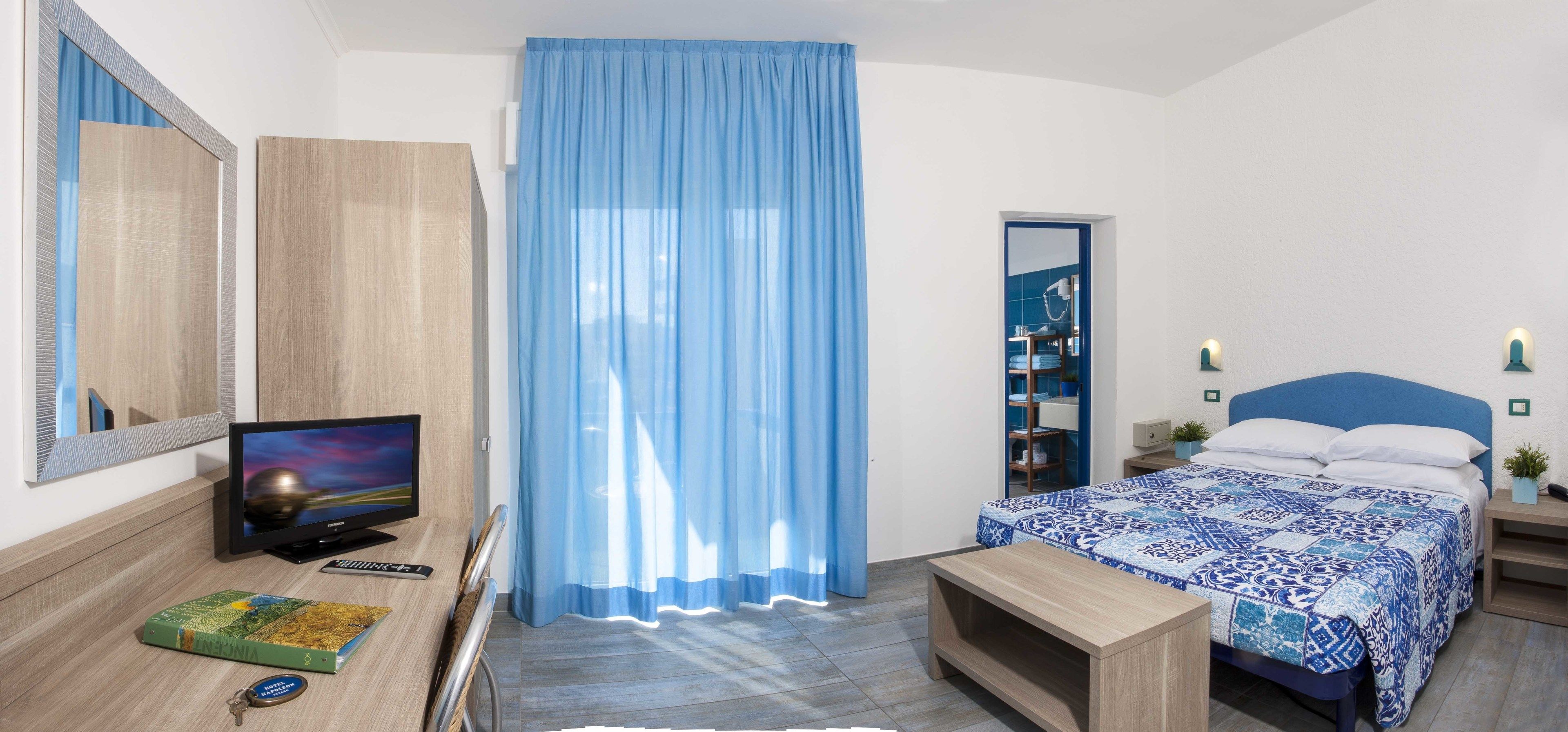 double or twin room, partial sea view | 1 bedroom, minibar, in-room safe, desk