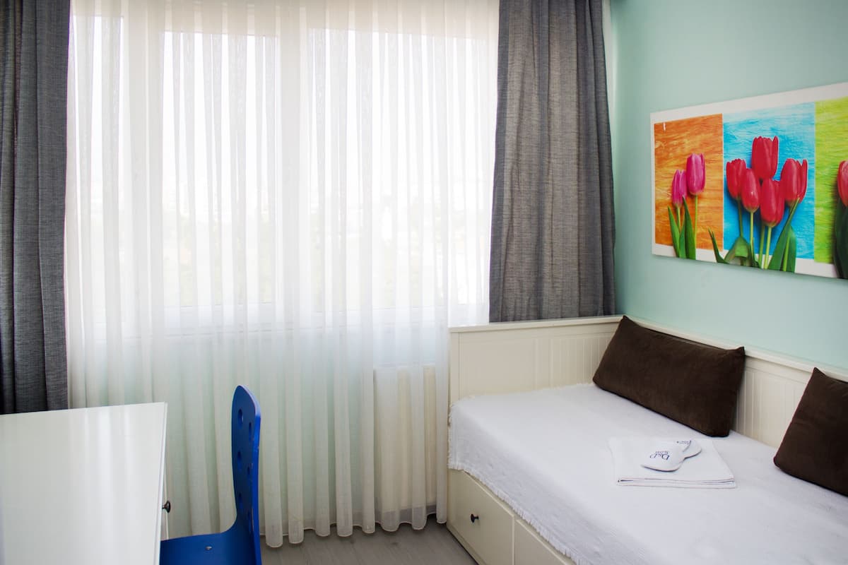 ห้องแฟมิลี่สวีท, ระเบียง | 1 ห้องนอน, ผ้าปูที่นอนฝ้ายอียิปต์, เครื่องนอนระดับพรีเมียม, ผ้านวมขนเป็ด