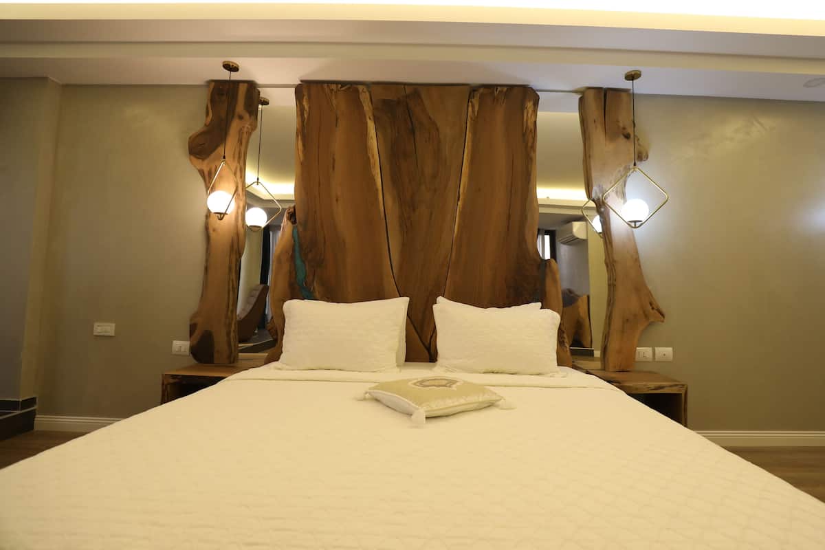 Deluxe Double Room, Balcony | 2 bedrooms, in-room safe, desk, soundproofing