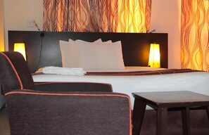 In-room safe, desk, laptop workspace, bed sheets - Lakeem Suites Adebola (Lagos)