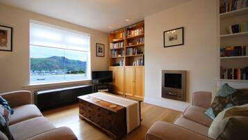 House, Multiple Beds | Living area | 30-inch TV with digital channels, DVD player, MP3 dock