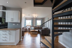 Baita, letti multipli | Area soggiorno | TV 30 pollici con canali digitali, lettore DVD