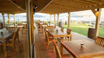 Departamento, 1 cama Queen size | Restaurantes