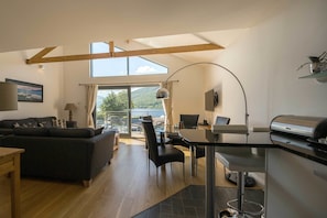 Apartment, Multiple Beds | Living area | TV