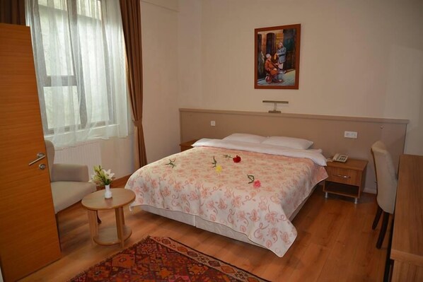 Premium bedding, minibar, in-room safe, desk