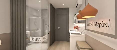 A modern hotel room with a glass partition, a visible bathroom, a sink, and a wall-mounted lamp.