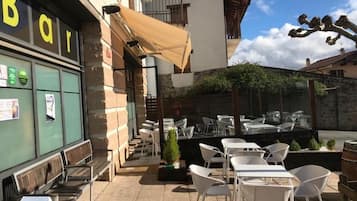 Breakfast, lunch, dinner served; local cuisine, al fresco dining