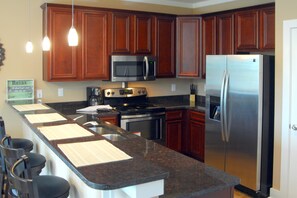 Apartment | Private kitchen | Fridge, microwave, oven, stovetop