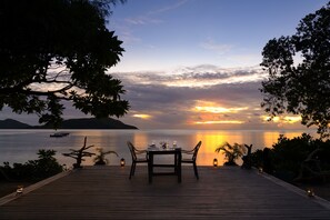Breakfast, lunch, dinner served; beach views