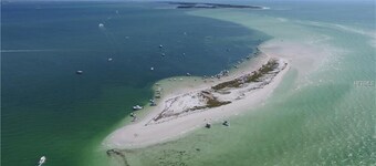 Coastal Escape Awaits: Enjoy a Complimentary Pontoon Boat Adventure!