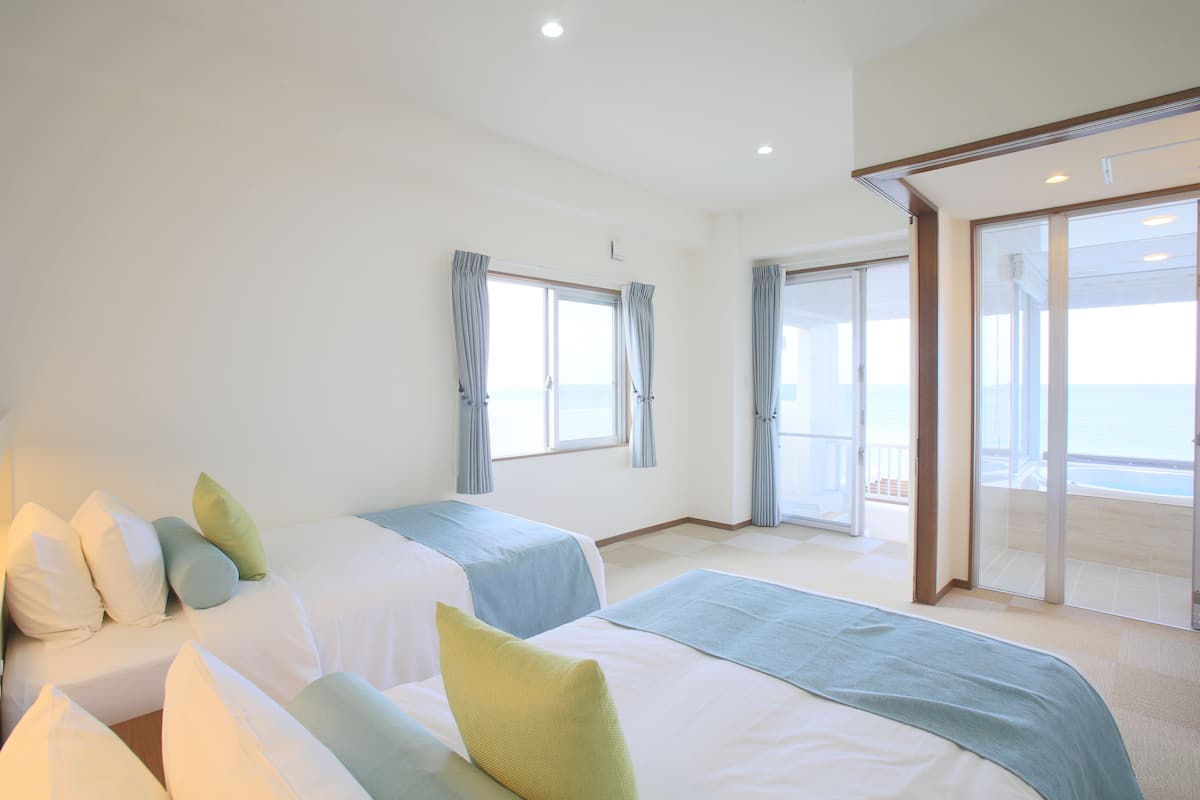 standard twin room, multiple beds, oceanfront | in-room safe, soundproofing, free cots/infant beds, free wifi