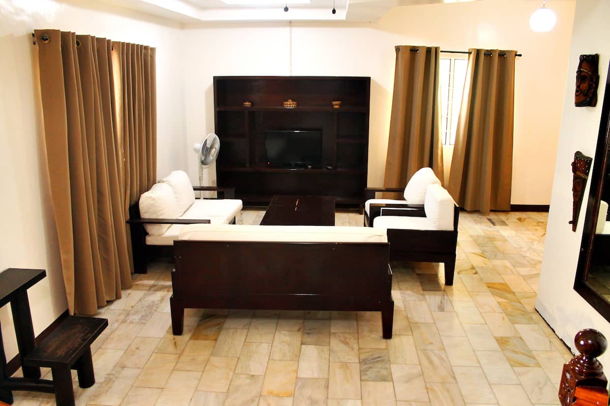 3 bedroom villa | living area | flat-screen tv