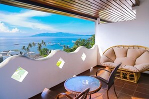 Suite Room | Minibar, iron/ironing board, free WiFi, bed sheets - Steps Garden Resort (Puerto Galera)