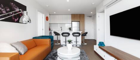 Apartment, 2 Bedrooms | Living area | 49-inch LCD TV with digital channels, TV, Netflix