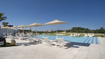 Outdoor pool, pool umbrellas, pool loungers