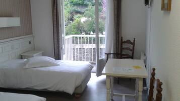 Desk, blackout drapes, soundproofing, iron/ironing board