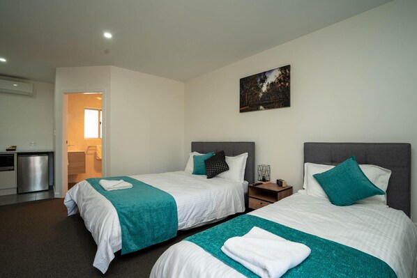 Habitación Deluxe | Escritorio, cortinas blackout y insonorización 