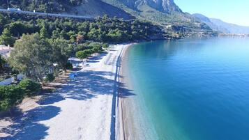 Beach nearby, sun loungers, beach umbrellas, beach bar