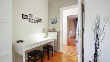 Suite, Balcony | Desk, iron/ironing board, free cribs/infant beds, rollaway beds