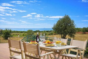 Pleiades Luxury Villa | Terrasse/patio