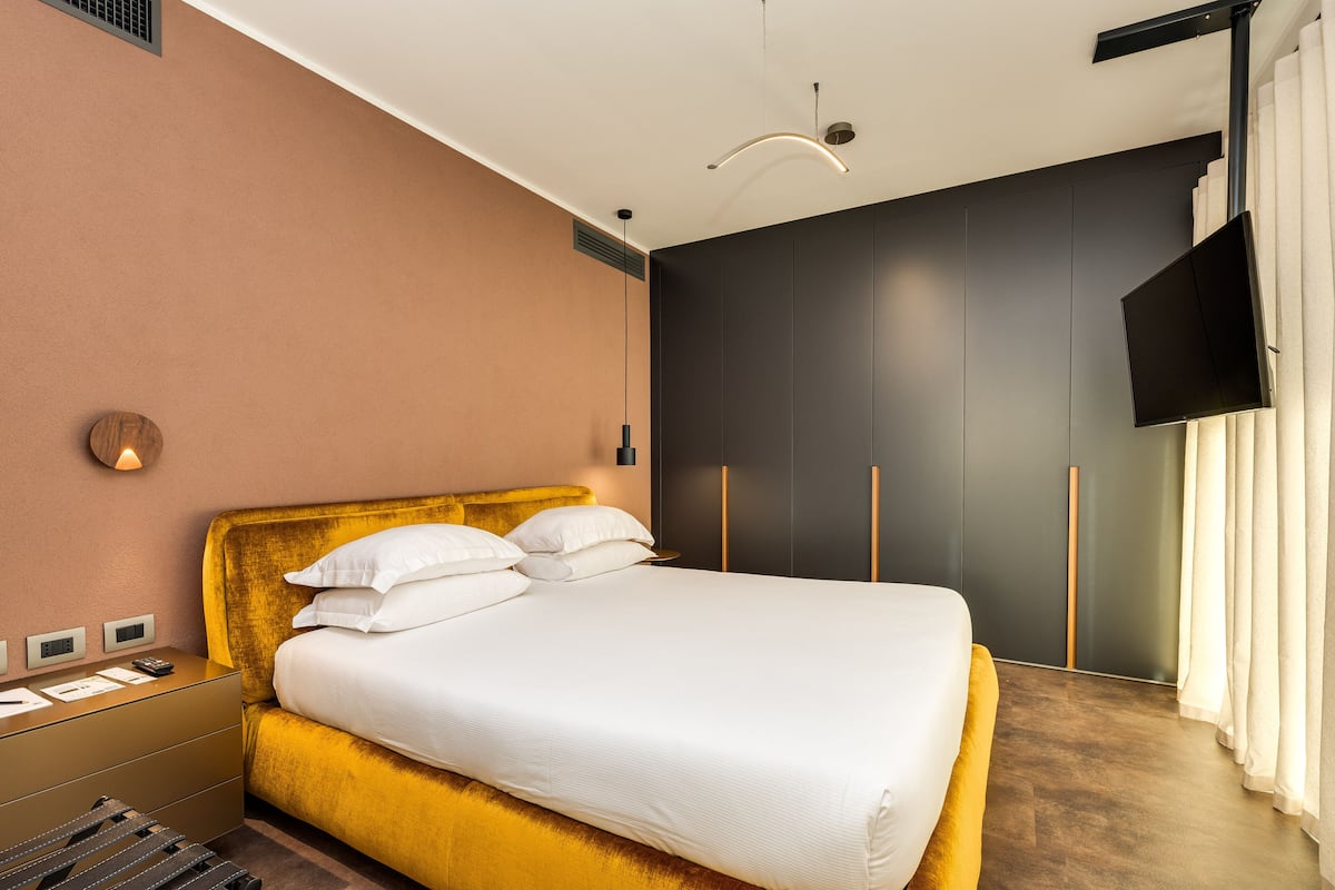 Design Apartment ( in a separated building far 100 mt from the main one) | 1 bedroom, minibar, in-room safe, laptop workspace