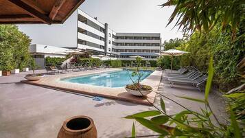 Outdoor pool, pool umbrellas, pool loungers