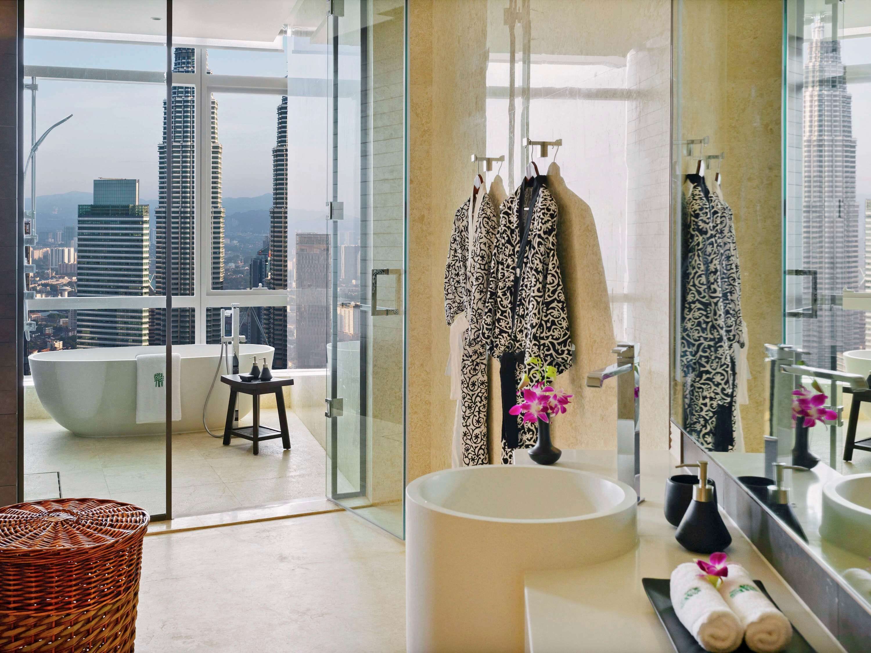 suite, 1 king bed (sanctuary suite, twin tower view) | bathroom | combined shower/bathtub, free toiletries, hair dryer, bathrobes