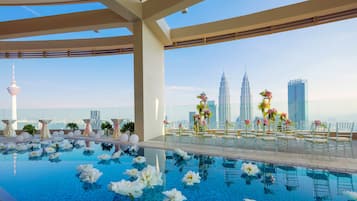 Outdoor pool, open 7:00 AM to 10:00 PM, sun loungers