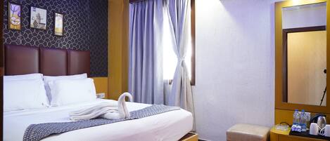 Ropa de cama de alta calidad y minibar