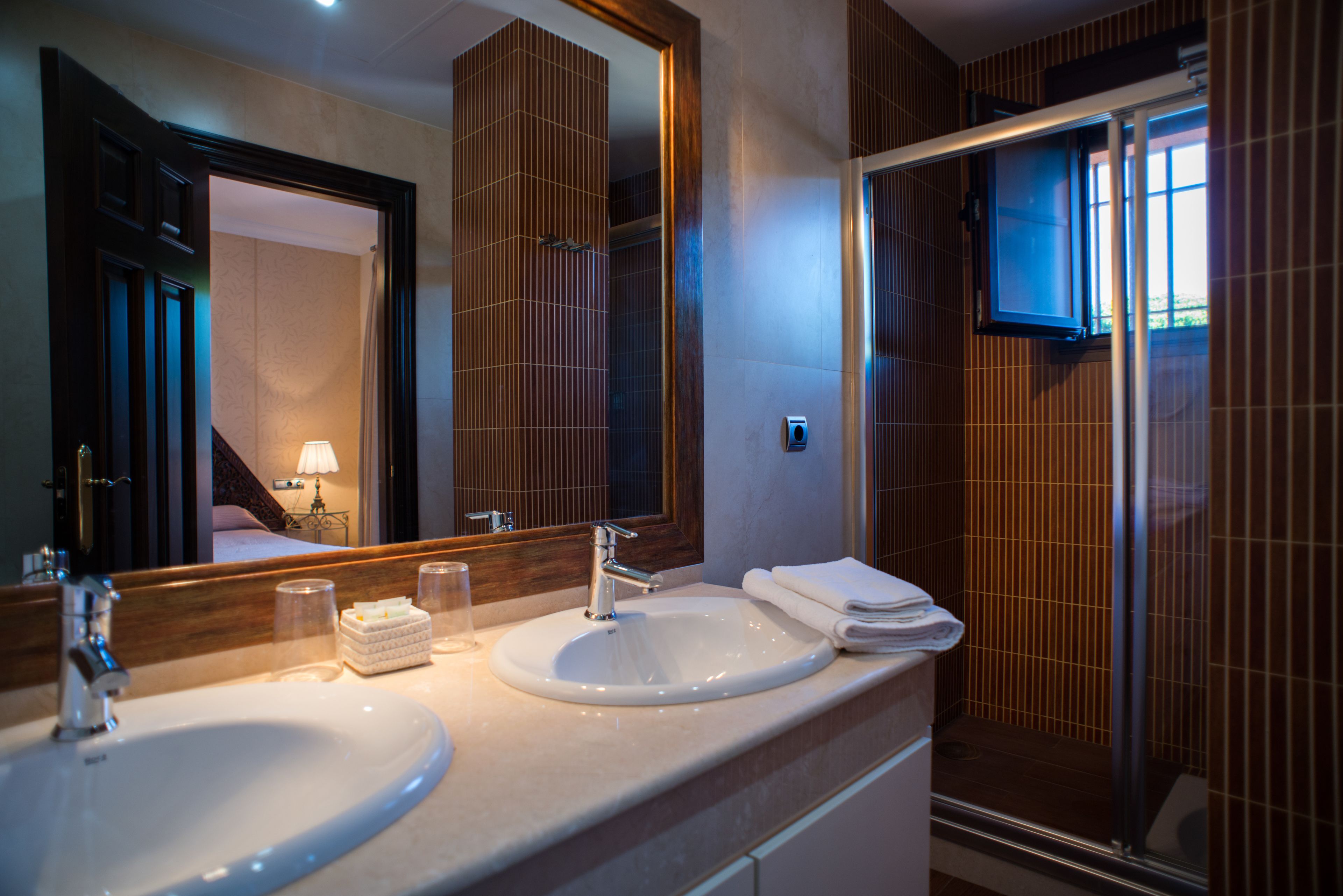 deluxe double room | bathroom | free toiletries, hair dryer, towels