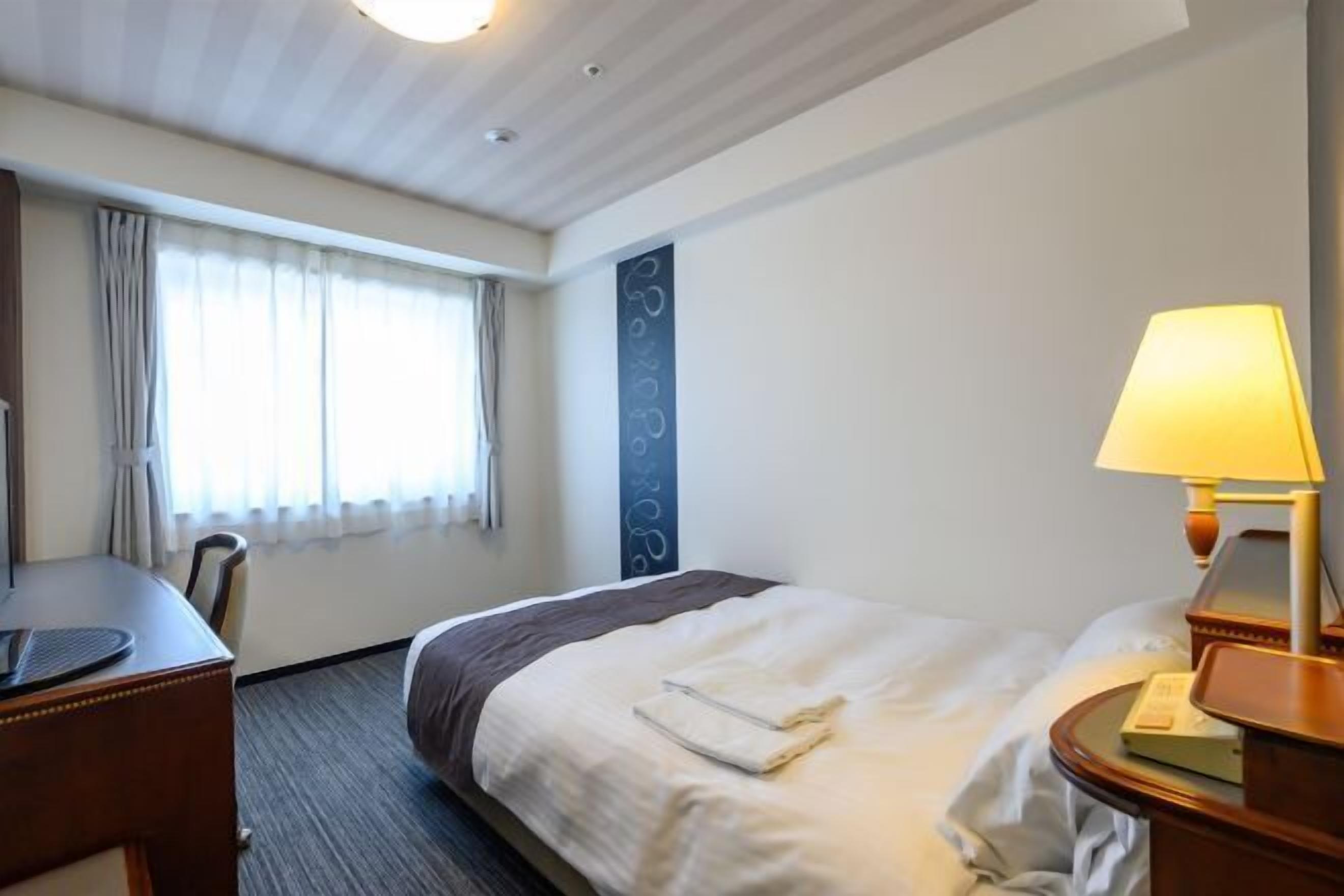 Desk, free WiFi, bed sheets